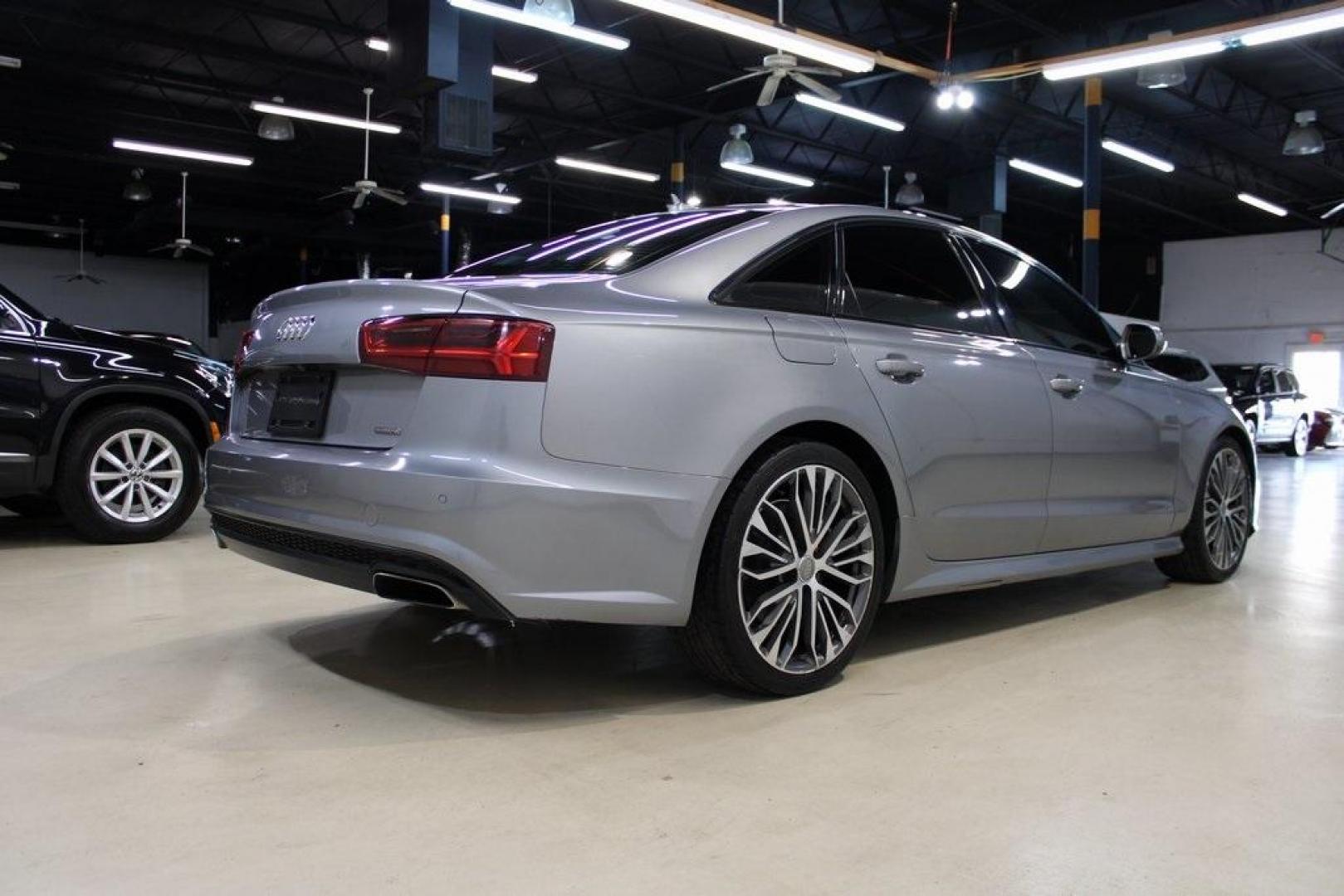 2016 Florett Silver Metallic Audi A6 2.0T Premium (WAUFFAFC0GN) with an 2.0L 4-Cylinder TFSI engine, Automatic transmission, located at 15300 Midway Rd., Addison, TX, 75001, (972) 702-0011, 32.958321, -96.838074 - Photo#2