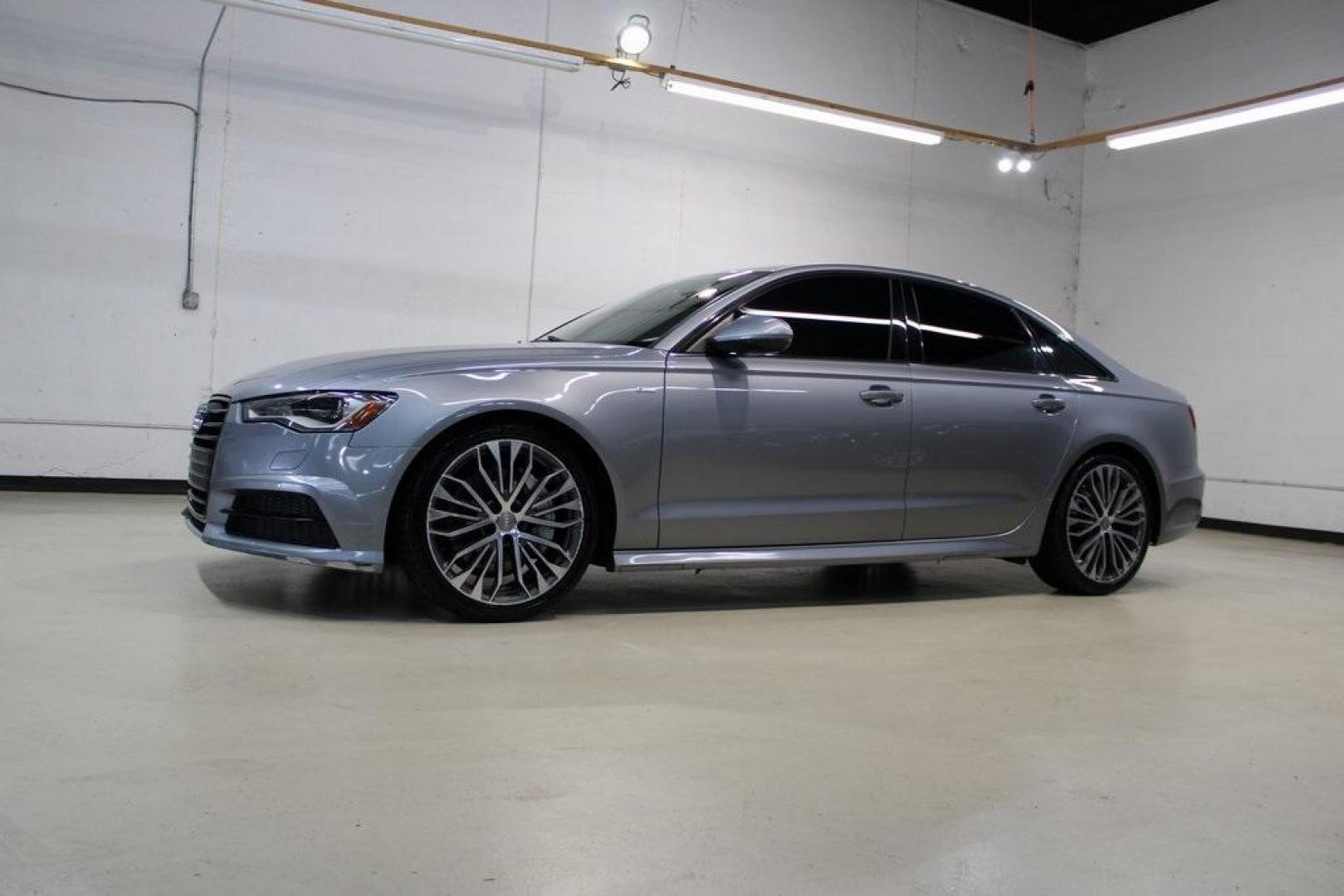 2016 Florett Silver Metallic Audi A6 2.0T Premium (WAUFFAFC0GN) with an 2.0L 4-Cylinder TFSI engine, Automatic transmission, located at 15300 Midway Rd., Addison, TX, 75001, (972) 702-0011, 32.958321, -96.838074 - Photo#4