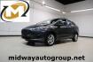 2019 Magnetic /Charcoal Black Ford Fiesta SE (3FADP4BJ1KM) with an 1.6L I4 Ti-VCT engine, Automatic transmission, located at 15300 Midway Rd., Addison, TX, 75001, (972) 702-0011, 32.958321, -96.838074 - Photo#0