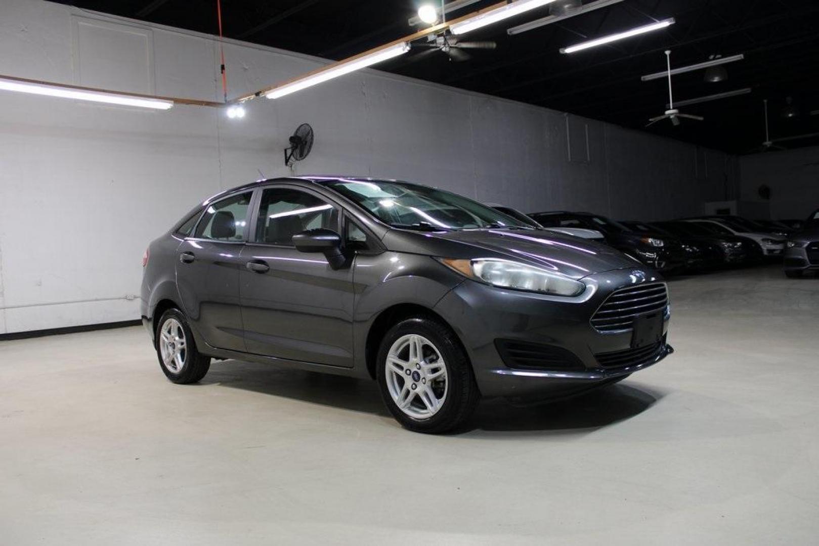 2019 Magnetic /Charcoal Black Ford Fiesta SE (3FADP4BJ1KM) with an 1.6L I4 Ti-VCT engine, Automatic transmission, located at 15300 Midway Rd., Addison, TX, 75001, (972) 702-0011, 32.958321, -96.838074 - Photo#5