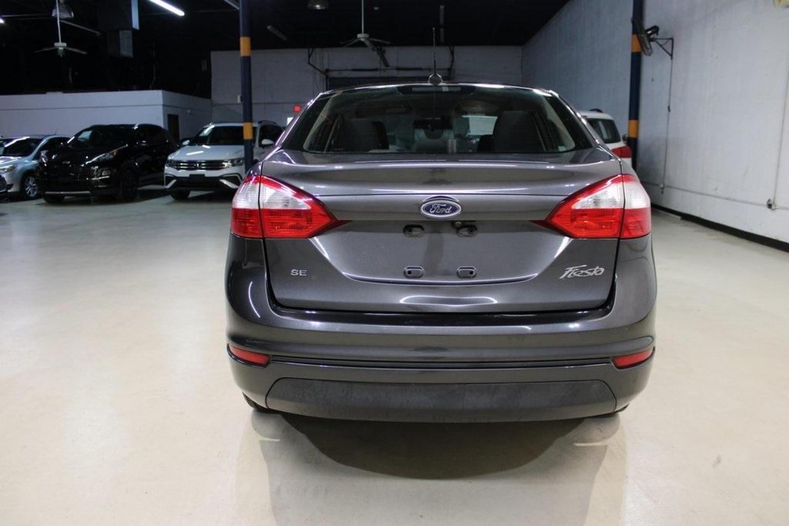 2019 Magnetic /Charcoal Black Ford Fiesta SE (3FADP4BJ1KM) with an 1.6L I4 Ti-VCT engine, Automatic transmission, located at 15300 Midway Rd., Addison, TX, 75001, (972) 702-0011, 32.958321, -96.838074 - Photo#6