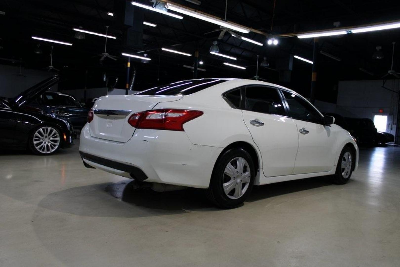 2017 Glacier White /Charcoal Nissan Altima 2.5 S (1N4AL3APXHC) with an 2.5L 4-Cylinder DOHC 16V engine, CVT transmission, located at 15300 Midway Rd., Addison, TX, 75001, (972) 702-0011, 32.958321, -96.838074 - Photo#2