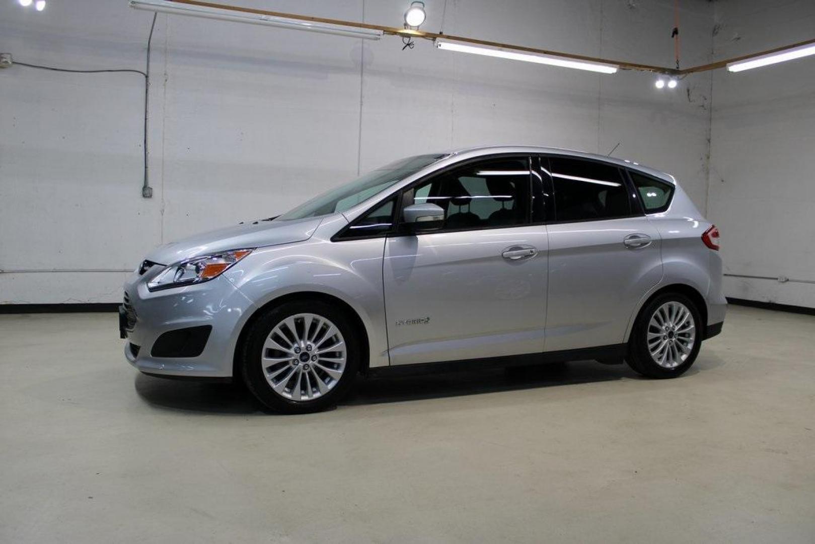 2018 Ingot Silver /Charcoal Black Ford C-Max Hybrid SE (1FADP5AU1JL) with an I4 Hybrid engine, CVT transmission, located at 15300 Midway Rd., Addison, TX, 75001, (972) 702-0011, 32.958321, -96.838074 - Photo#4