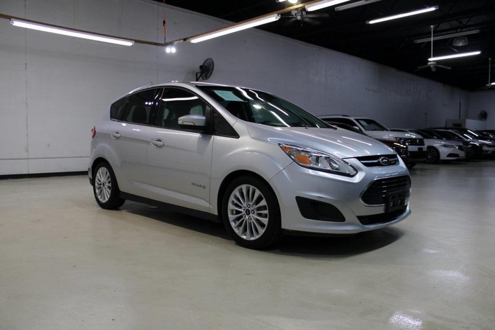 2018 Ingot Silver /Charcoal Black Ford C-Max Hybrid SE (1FADP5AU1JL) with an I4 Hybrid engine, CVT transmission, located at 15300 Midway Rd., Addison, TX, 75001, (972) 702-0011, 32.958321, -96.838074 - Photo#6