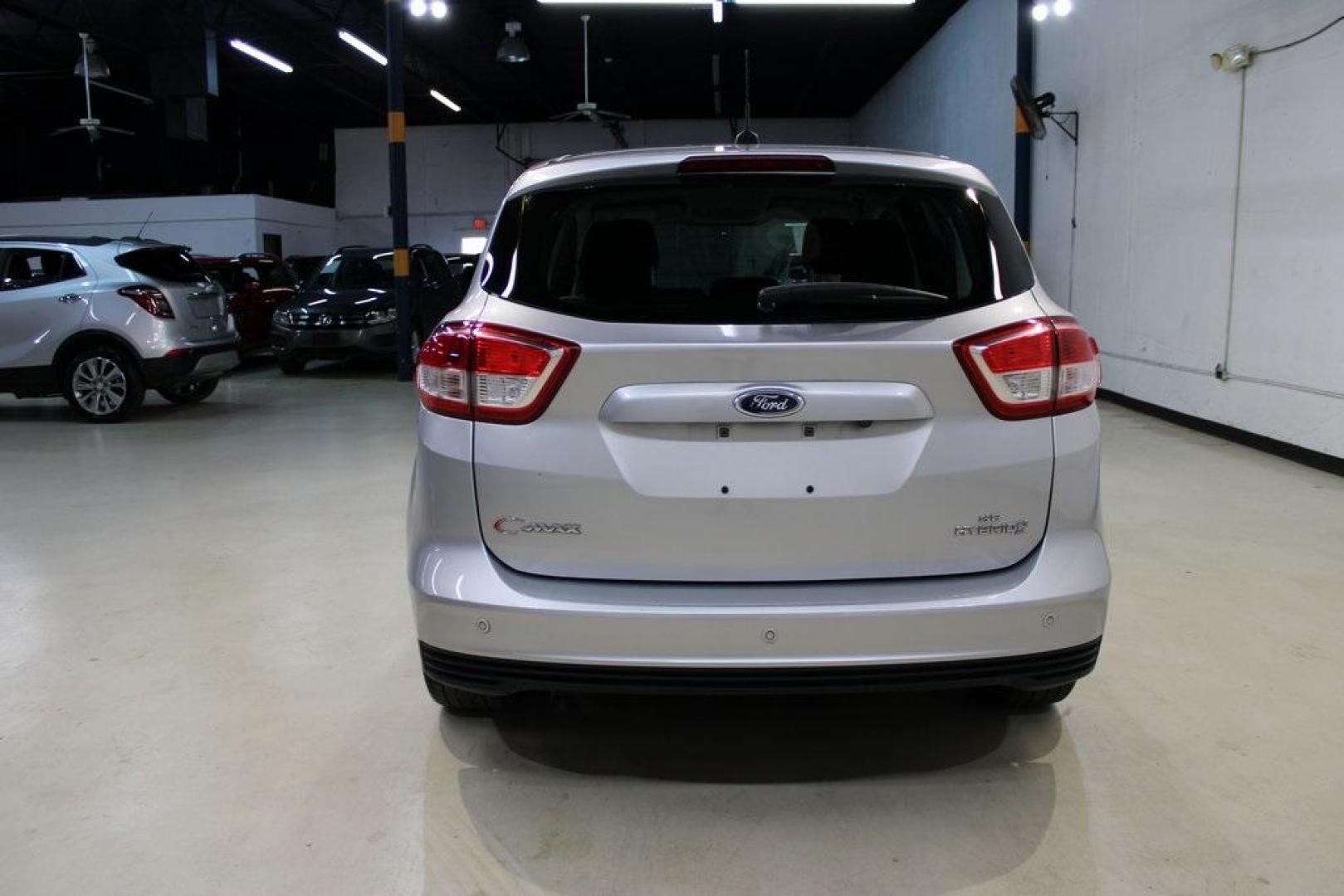 2018 Ingot Silver /Charcoal Black Ford C-Max Hybrid SE (1FADP5AU1JL) with an I4 Hybrid engine, CVT transmission, located at 15300 Midway Rd., Addison, TX, 75001, (972) 702-0011, 32.958321, -96.838074 - Photo#7