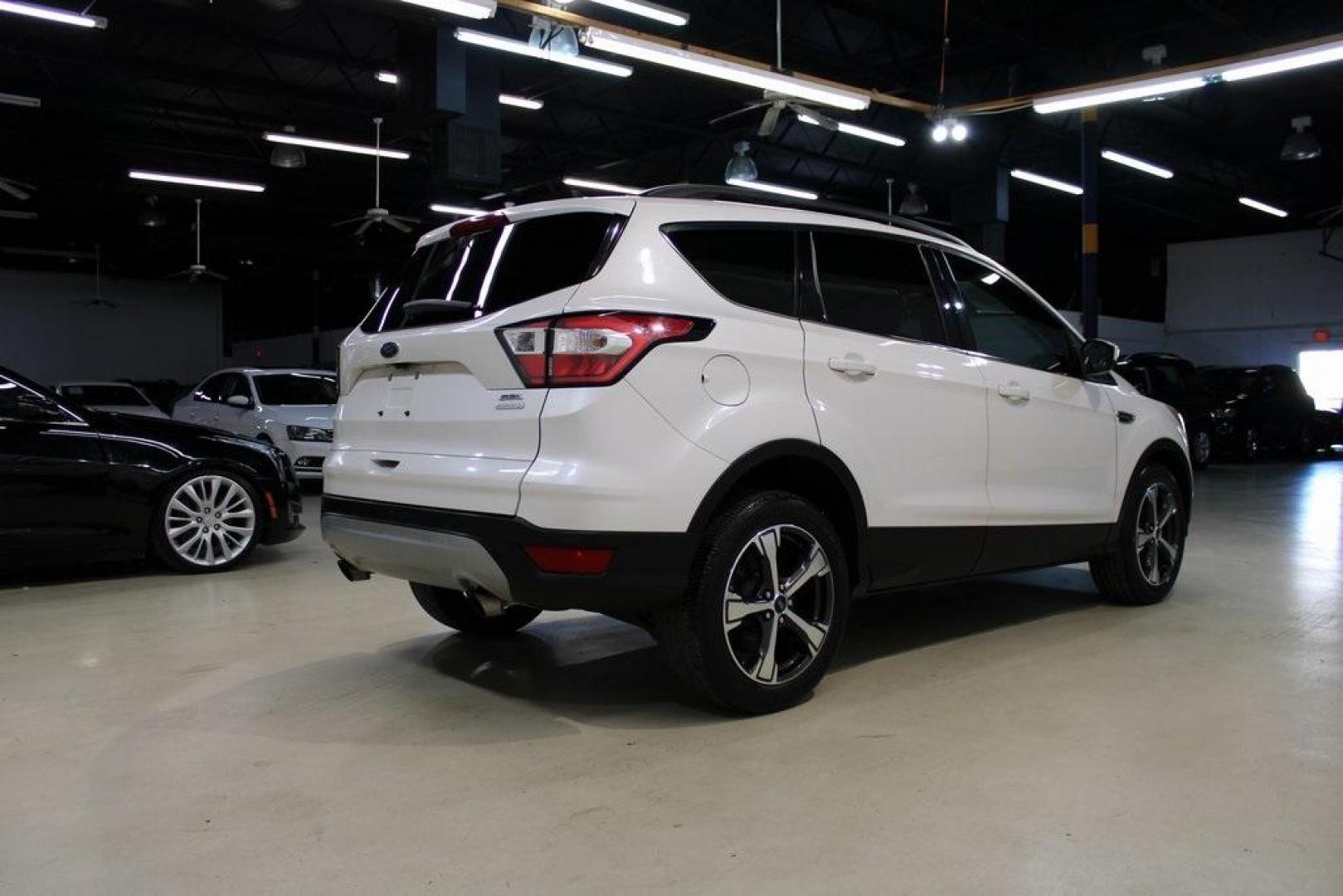 2018 White Platinum /Medium Light Stone Ford Escape SEL (1FMCU0HD2JU) with an 1.5L EcoBoost engine, Automatic transmission, located at 15300 Midway Rd., Addison, TX, 75001, (972) 702-0011, 32.958321, -96.838074 - Photo#2