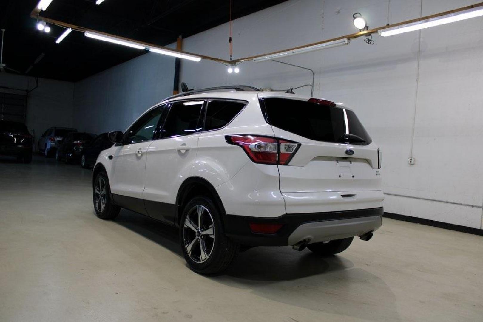 2018 White Platinum /Medium Light Stone Ford Escape SEL (1FMCU0HD2JU) with an 1.5L EcoBoost engine, Automatic transmission, located at 15300 Midway Rd., Addison, TX, 75001, (972) 702-0011, 32.958321, -96.838074 - Photo#3