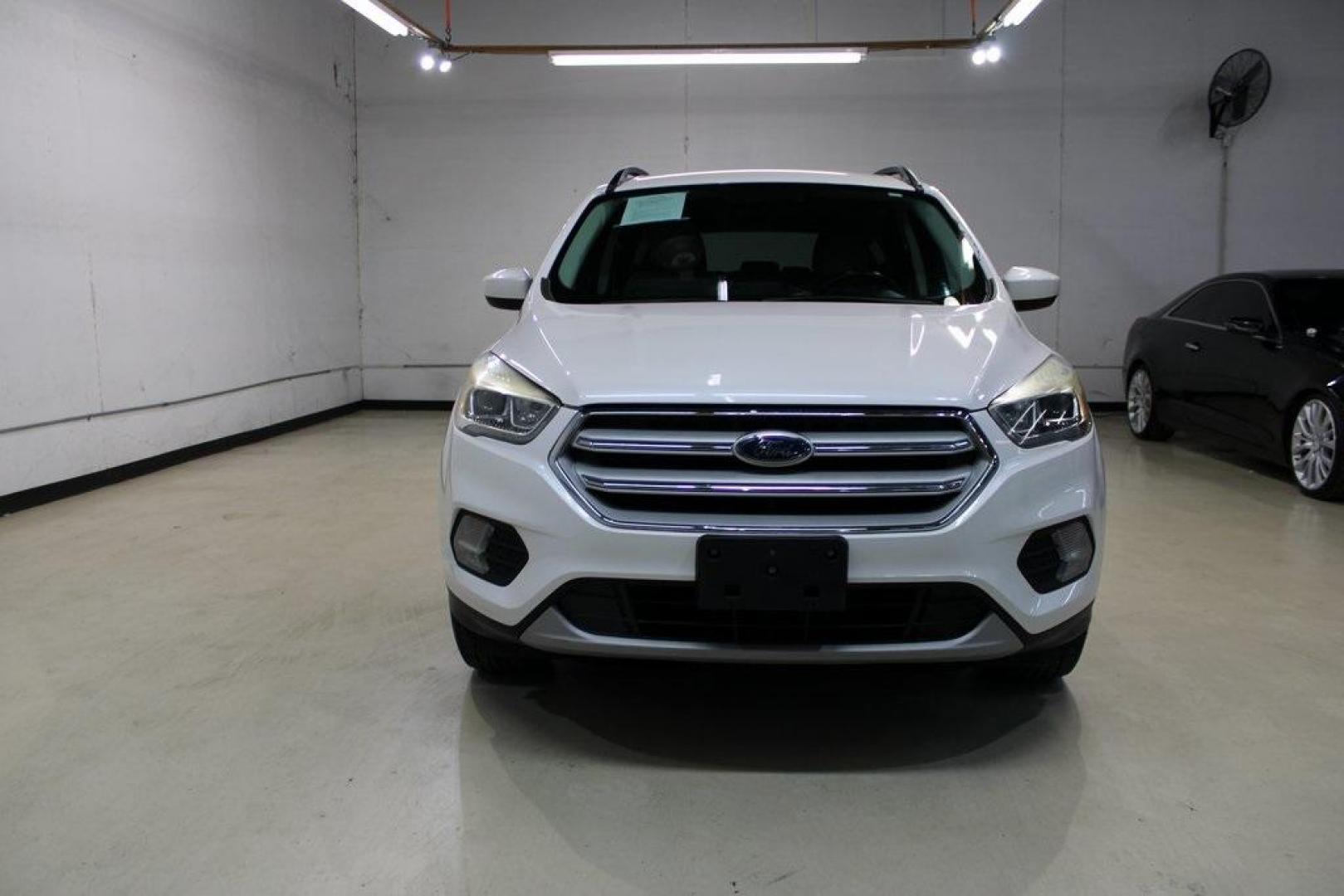 2018 White Platinum /Medium Light Stone Ford Escape SEL (1FMCU0HD2JU) with an 1.5L EcoBoost engine, Automatic transmission, located at 15300 Midway Rd., Addison, TX, 75001, (972) 702-0011, 32.958321, -96.838074 - Photo#5