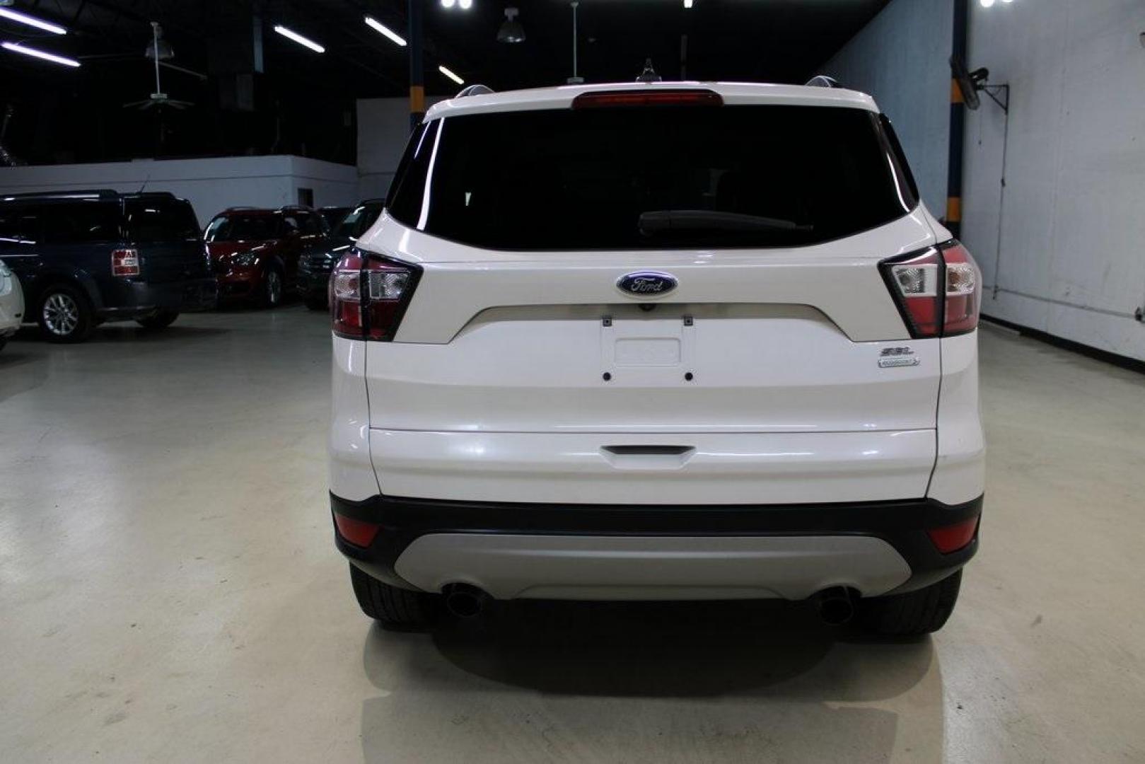 2018 White Platinum /Medium Light Stone Ford Escape SEL (1FMCU0HD2JU) with an 1.5L EcoBoost engine, Automatic transmission, located at 15300 Midway Rd., Addison, TX, 75001, (972) 702-0011, 32.958321, -96.838074 - Photo#7