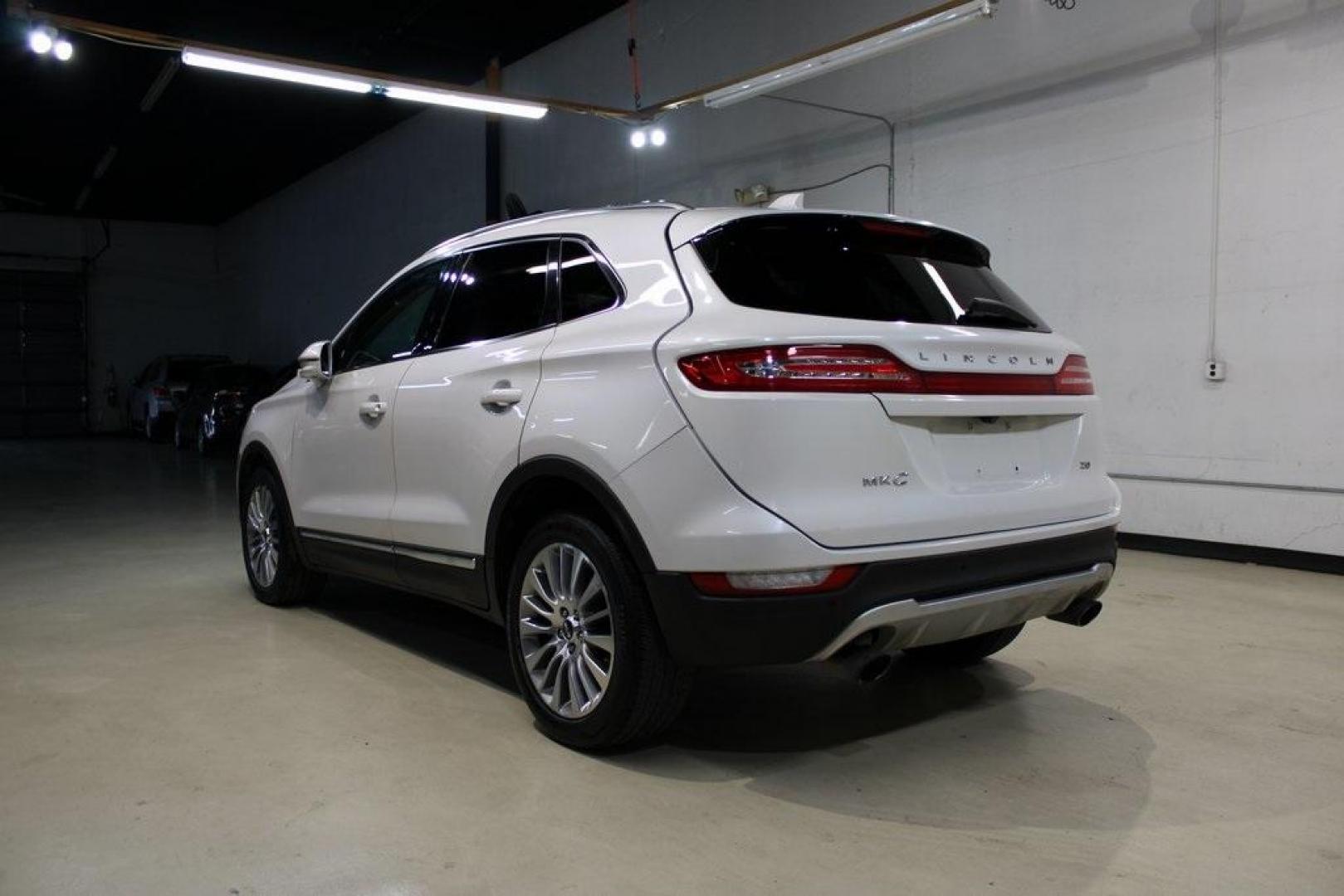 2017 White Platinum Clearcoat Metallic /Espresso Lincoln MKC Reserve (5LMCJ3C90HU) with an 2.0L GTDi engine, Automatic transmission, located at 15300 Midway Rd., Addison, TX, 75001, (972) 702-0011, 32.958321, -96.838074 - Photo#2