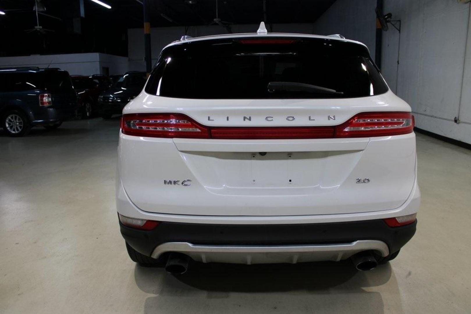 2017 White Platinum Clearcoat Metallic /Espresso Lincoln MKC Reserve (5LMCJ3C90HU) with an 2.0L GTDi engine, Automatic transmission, located at 15300 Midway Rd., Addison, TX, 75001, (972) 702-0011, 32.958321, -96.838074 - Photo#6