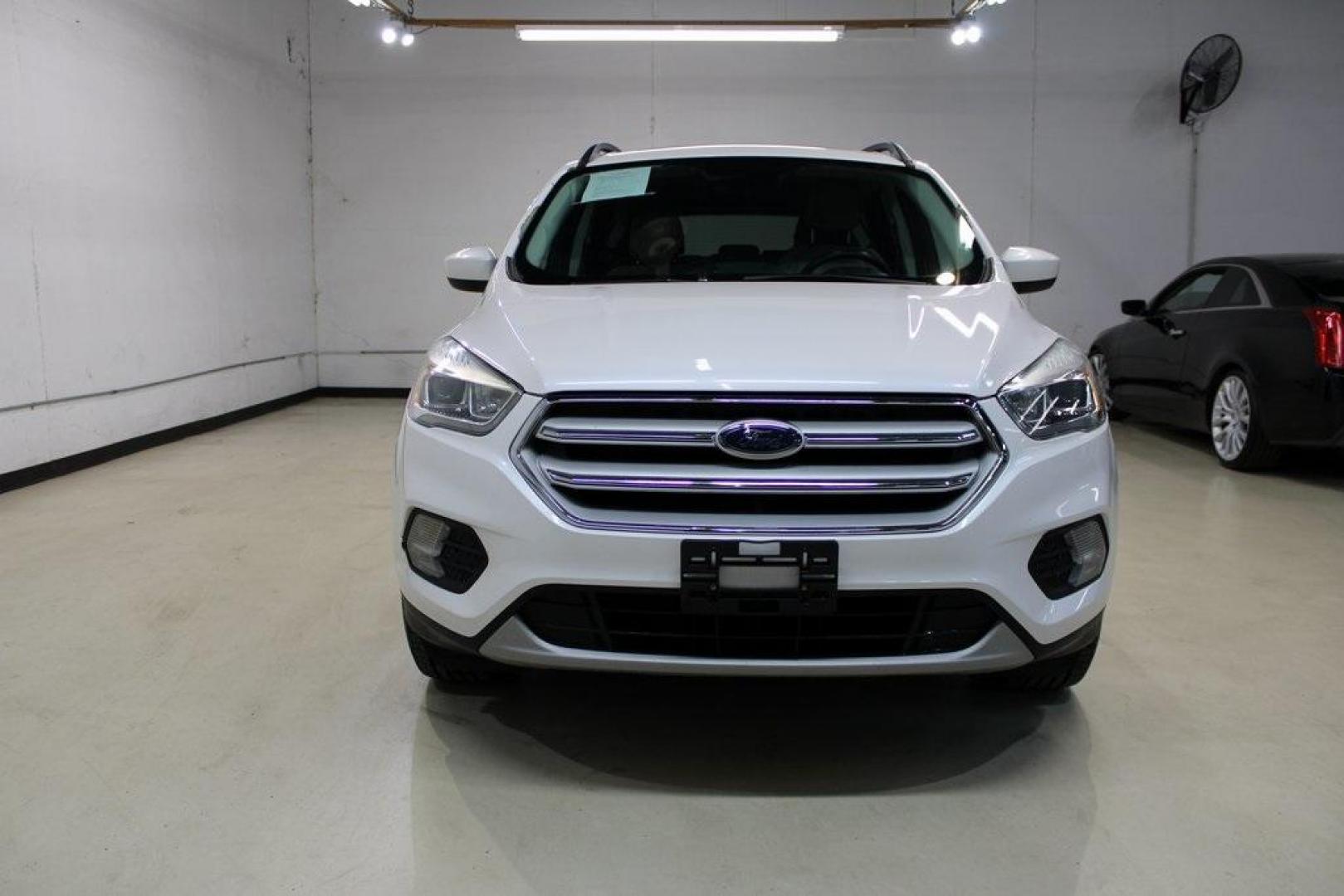 2018 White Platinum /Medium Light Stone Ford Escape SEL (1FMCU9HD7JU) with an 1.5L EcoBoost engine, Automatic transmission, located at 15300 Midway Rd., Addison, TX, 75001, (972) 702-0011, 32.958321, -96.838074 - Photo#5