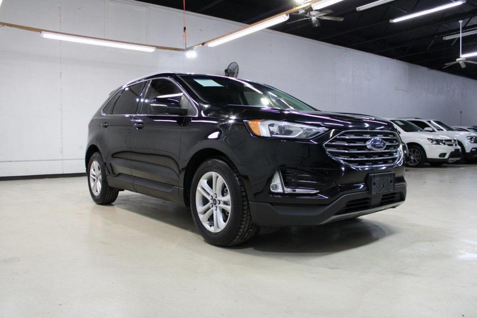 2020 Black /Ebony Ford Edge SEL (2FMPK3J9XLB) with an EcoBoost 2.0L I4 GTDi DOHC Turbocharged VCT engine, Automatic transmission, located at 15300 Midway Rd., Addison, TX, 75001, (972) 702-0011, 32.958321, -96.838074 - Photo#1