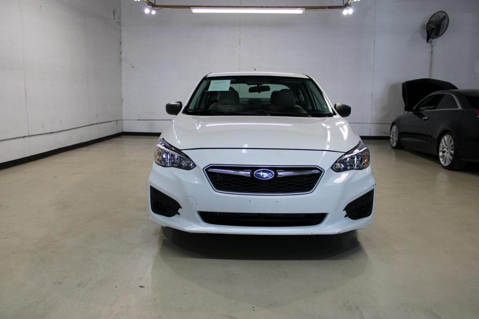 2018 Whc /Ivory Subaru Impreza 2.0i (4S3GKAA65J3) with an 2.0L 4-Cylinder DOHC 16V engine, CVT transmission, located at 15300 Midway Rd., Addison, TX, 75001, (972) 702-0011, 32.958321, -96.838074 - Photo#6