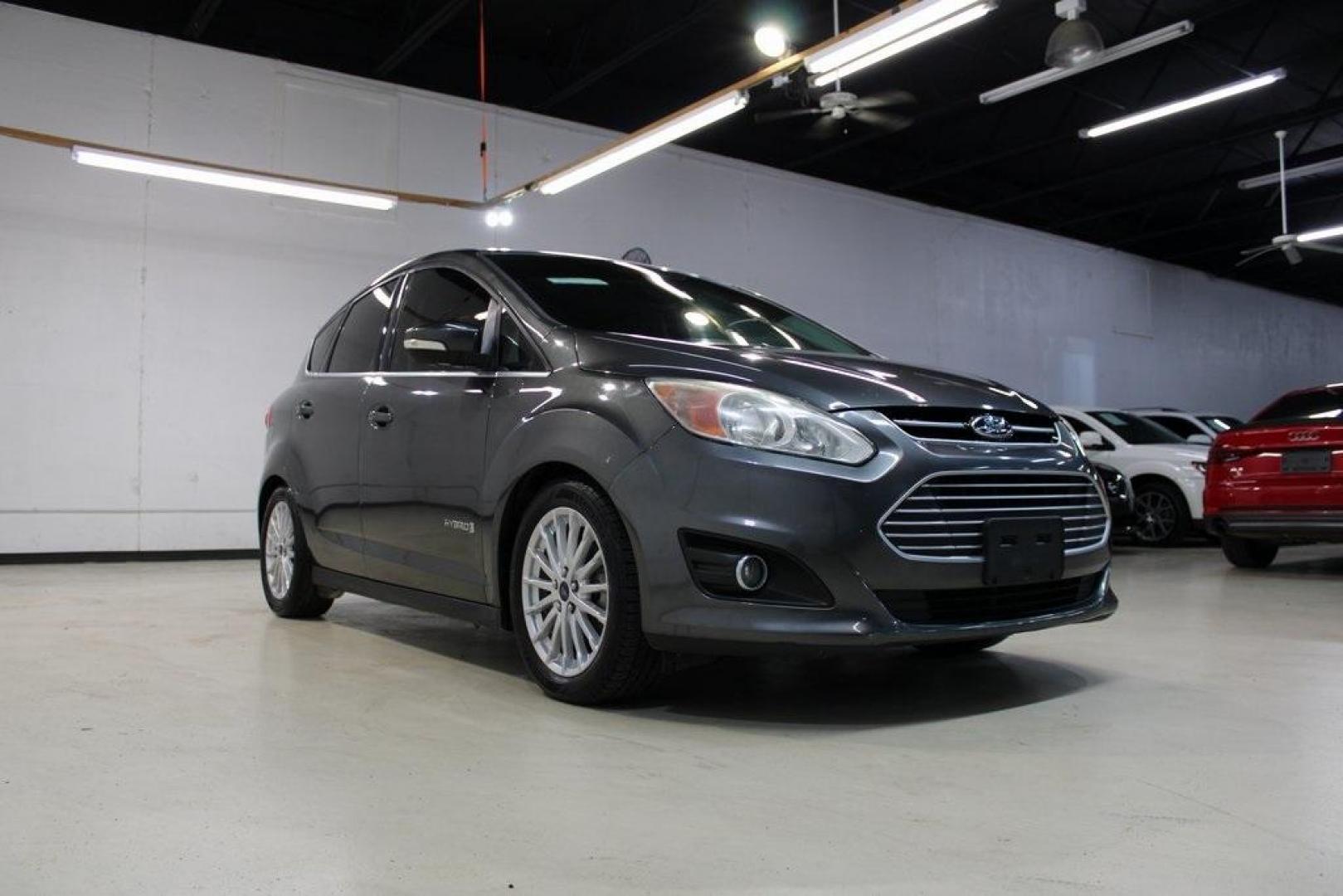 2015 Magnetic /Medium Light Stone Ford C-Max Hybrid SEL (1FADP5BU1FL) with an I4 Hybrid engine, CVT transmission, located at 15300 Midway Rd., Addison, TX, 75001, (972) 702-0011, 32.958321, -96.838074 - Photo#1