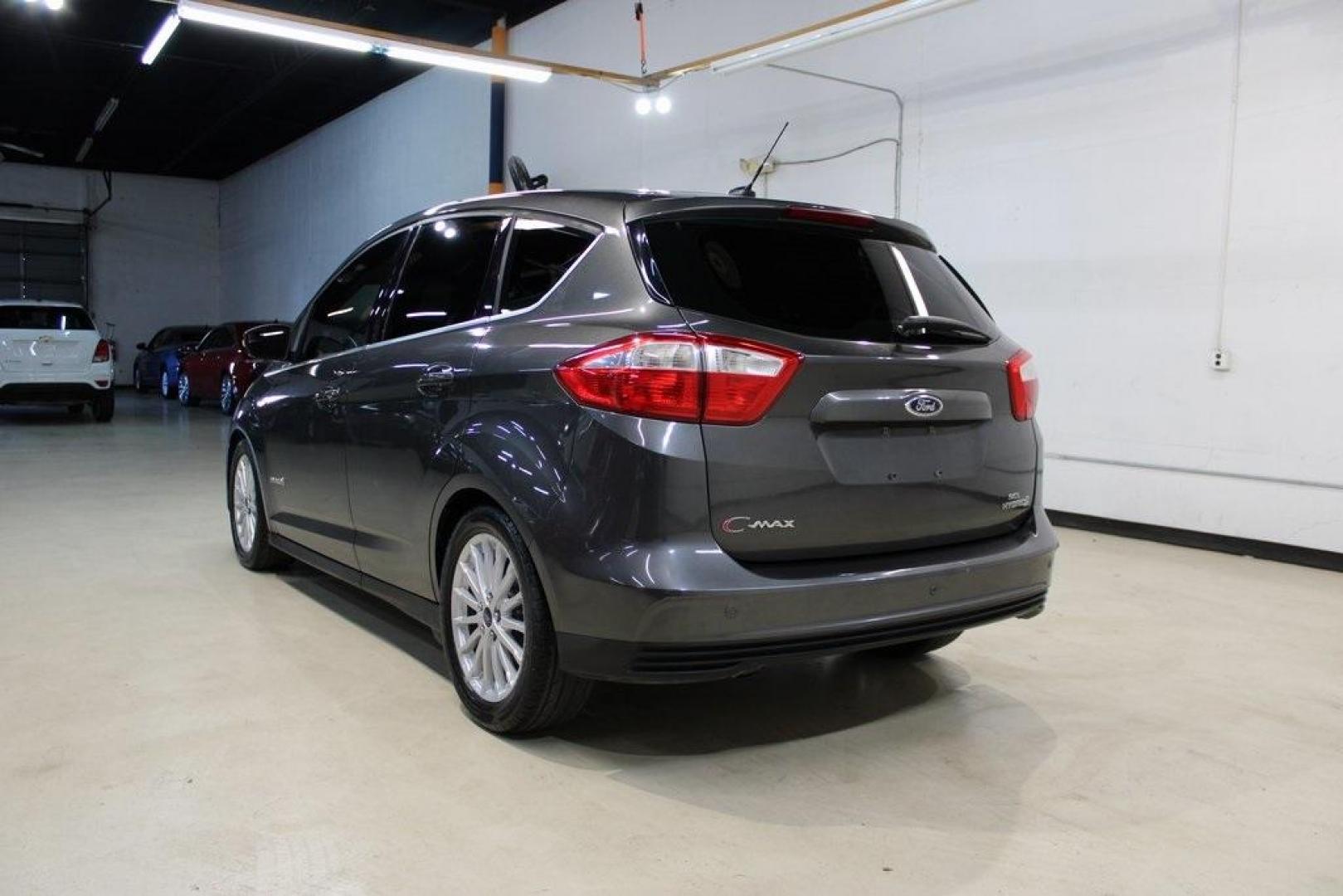 2015 Magnetic /Medium Light Stone Ford C-Max Hybrid SEL (1FADP5BU1FL) with an I4 Hybrid engine, CVT transmission, located at 15300 Midway Rd., Addison, TX, 75001, (972) 702-0011, 32.958321, -96.838074 - Photo#3