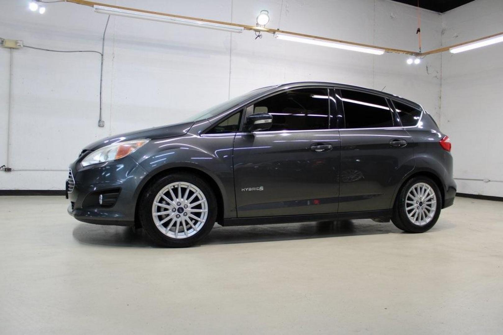 2015 Magnetic /Medium Light Stone Ford C-Max Hybrid SEL (1FADP5BU1FL) with an I4 Hybrid engine, CVT transmission, located at 15300 Midway Rd., Addison, TX, 75001, (972) 702-0011, 32.958321, -96.838074 - Photo#4