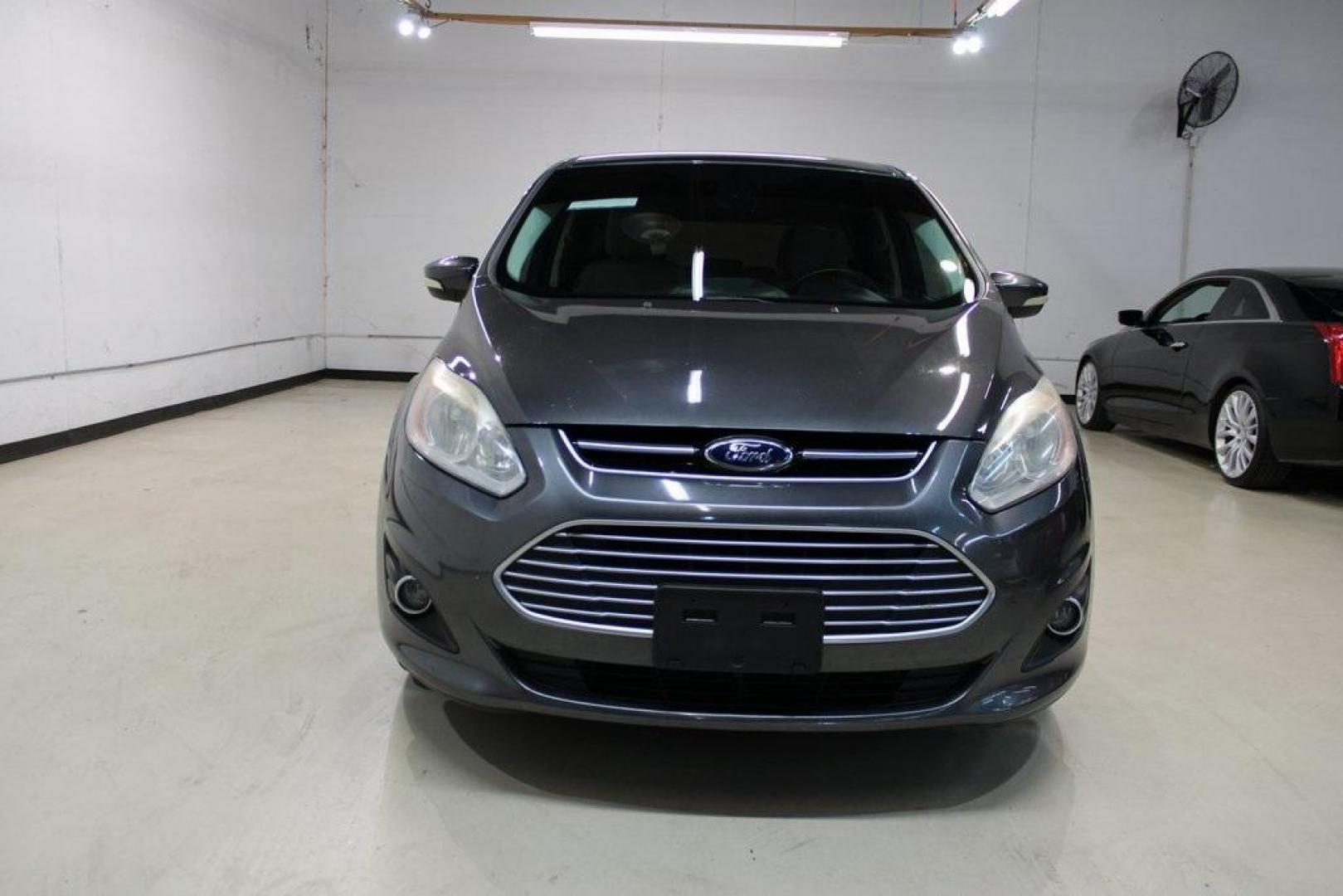 2015 Magnetic /Medium Light Stone Ford C-Max Hybrid SEL (1FADP5BU1FL) with an I4 Hybrid engine, CVT transmission, located at 15300 Midway Rd., Addison, TX, 75001, (972) 702-0011, 32.958321, -96.838074 - Photo#5