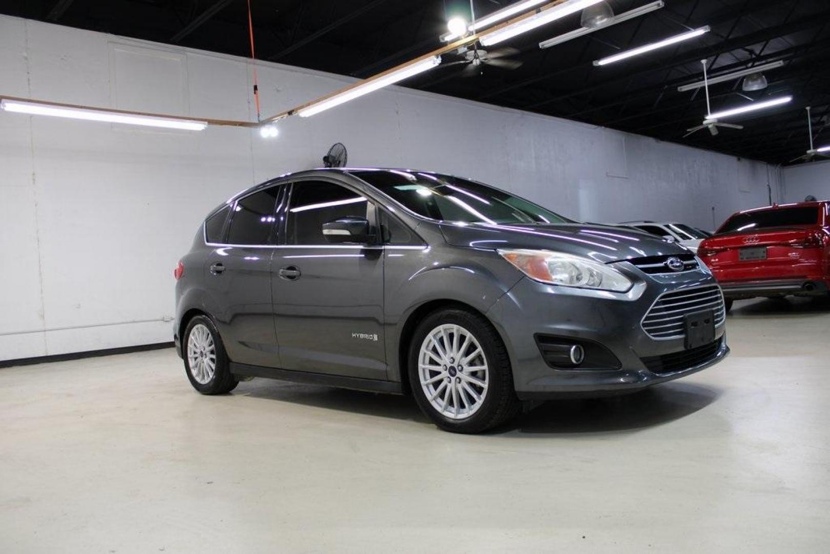 2015 Magnetic /Medium Light Stone Ford C-Max Hybrid SEL (1FADP5BU1FL) with an I4 Hybrid engine, CVT transmission, located at 15300 Midway Rd., Addison, TX, 75001, (972) 702-0011, 32.958321, -96.838074 - Photo#6