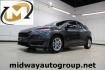 2017 Magnetic /Charcoal Black Ford Focus SE (1FADP3K21HL) with an 2.0L 4-Cylinder DGI Flex Fuel DOHC engine, Automatic transmission, located at 15300 Midway Rd., Addison, TX, 75001, (972) 702-0011, 32.958321, -96.838074 - Photo#0