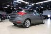 2017 Magnetic /Charcoal Black Ford Focus SE (1FADP3K21HL) with an 2.0L 4-Cylinder DGI Flex Fuel DOHC engine, Automatic transmission, located at 15300 Midway Rd., Addison, TX, 75001, (972) 702-0011, 32.958321, -96.838074 - Photo#2