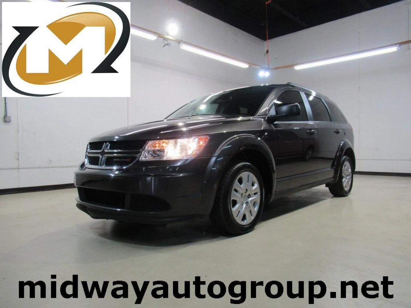 2019 Granite Crystal Metallic Clearcoat /Black Dodge Journey SE (3C4PDCAB6KT) with an 2.4L I4 DOHC 16V Dual VVT engine, Automatic transmission, located at 15300 Midway Rd., Addison, TX, 75001, (972) 702-0011, 32.958321, -96.838074 - HOME OF THE NO HAGGLE PRICE - WHOLESALE PRICES TO THE PUBLIC!! Journey SE, 4D Sport Utility, 2.4L I4 DOHC 16V Dual VVT, 4-Speed Automatic VLP, FWD, Granite Crystal Metallic Clearcoat, Black Cloth.<br><br>Granite Crystal Metallic Clearcoat 2019 Dodge Journey SE<br><br>Recent Arrival!<br><br>Awards:<b - Photo#0