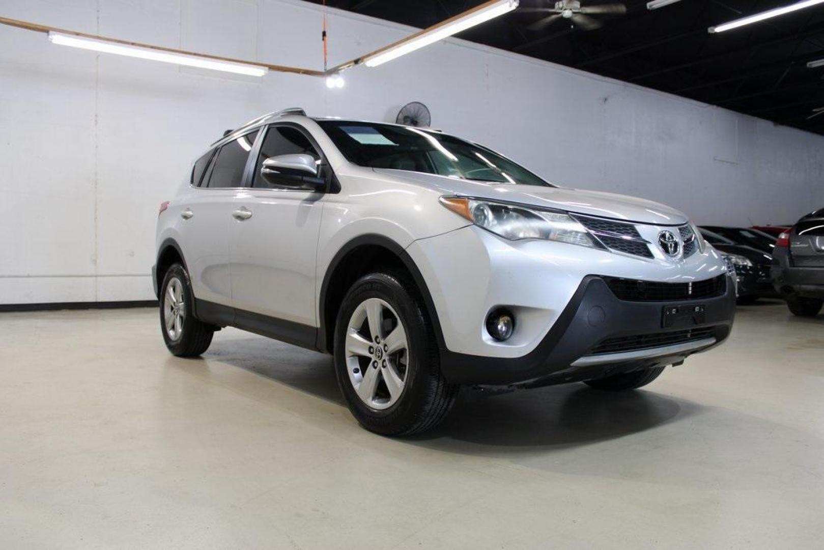 2015 Classic Silver Metallic /Terracotta Toyota RAV4 XLE (2T3WFREV7FW) with an 2.5L 4-Cylinder DOHC Dual VVT-i engine, Automatic transmission, located at 15300 Midway Rd., Addison, TX, 75001, (972) 702-0011, 32.958321, -96.838074 - HOME OF THE NO HAGGLE PRICE - WHOLESALE PRICES TO THE PUBLIC!! Backup Camera, RAV4 XLE, 4D Sport Utility, 2.5L 4-Cylinder DOHC Dual VVT-i, 6-Speed Automatic, FWD, Silver, Terracotta w/SofTex Seat Trim.<br><br>Silver 2015 Toyota RAV4 XLE<br><br>24/31 City/Highway MPG<br><br>Awards:<br> * 2015 IIHS T - Photo#1