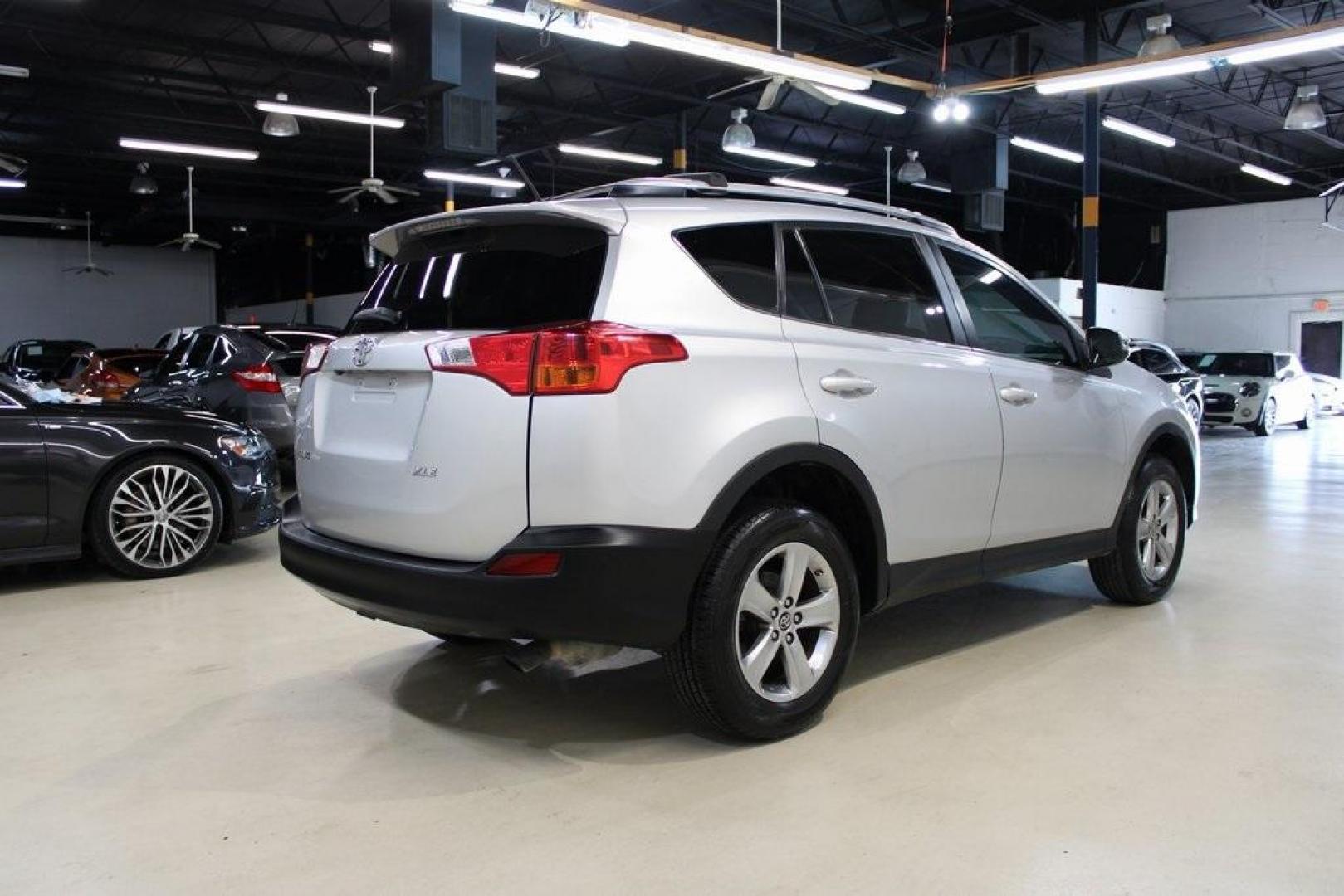 2015 Classic Silver Metallic /Terracotta Toyota RAV4 XLE (2T3WFREV7FW) with an 2.5L 4-Cylinder DOHC Dual VVT-i engine, Automatic transmission, located at 15300 Midway Rd., Addison, TX, 75001, (972) 702-0011, 32.958321, -96.838074 - HOME OF THE NO HAGGLE PRICE - WHOLESALE PRICES TO THE PUBLIC!! Backup Camera, RAV4 XLE, 4D Sport Utility, 2.5L 4-Cylinder DOHC Dual VVT-i, 6-Speed Automatic, FWD, Silver, Terracotta w/SofTex Seat Trim.<br><br>Silver 2015 Toyota RAV4 XLE<br><br>24/31 City/Highway MPG<br><br>Awards:<br> * 2015 IIHS T - Photo#2