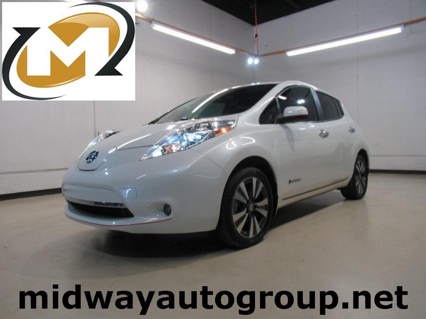 2015 Pearl White /Black Nissan Leaf SV (1N4AZ0CP7FC) with an Electric Motor engine, Automatic transmission, located at 15300 Midway Rd., Addison, TX, 75001, (972) 702-0011, 32.958321, -96.838074 - HOME OF THE NO HAGGLE PRICE - WHOLESALE PRICES TO THE PUBLIC!! Backup Camera, Leaf SV, 4D Hatchback, 80kW AC Synchronous Motor, Single Speed Reducer, FWD, Pearl White, Black Cloth.<br><br>Pearl White 2015 Nissan Leaf SV<br><br>Recent Arrival! 126/101 City/Highway MPG<br><br>Awards:<br> * 2015 KBB.c - Photo#0