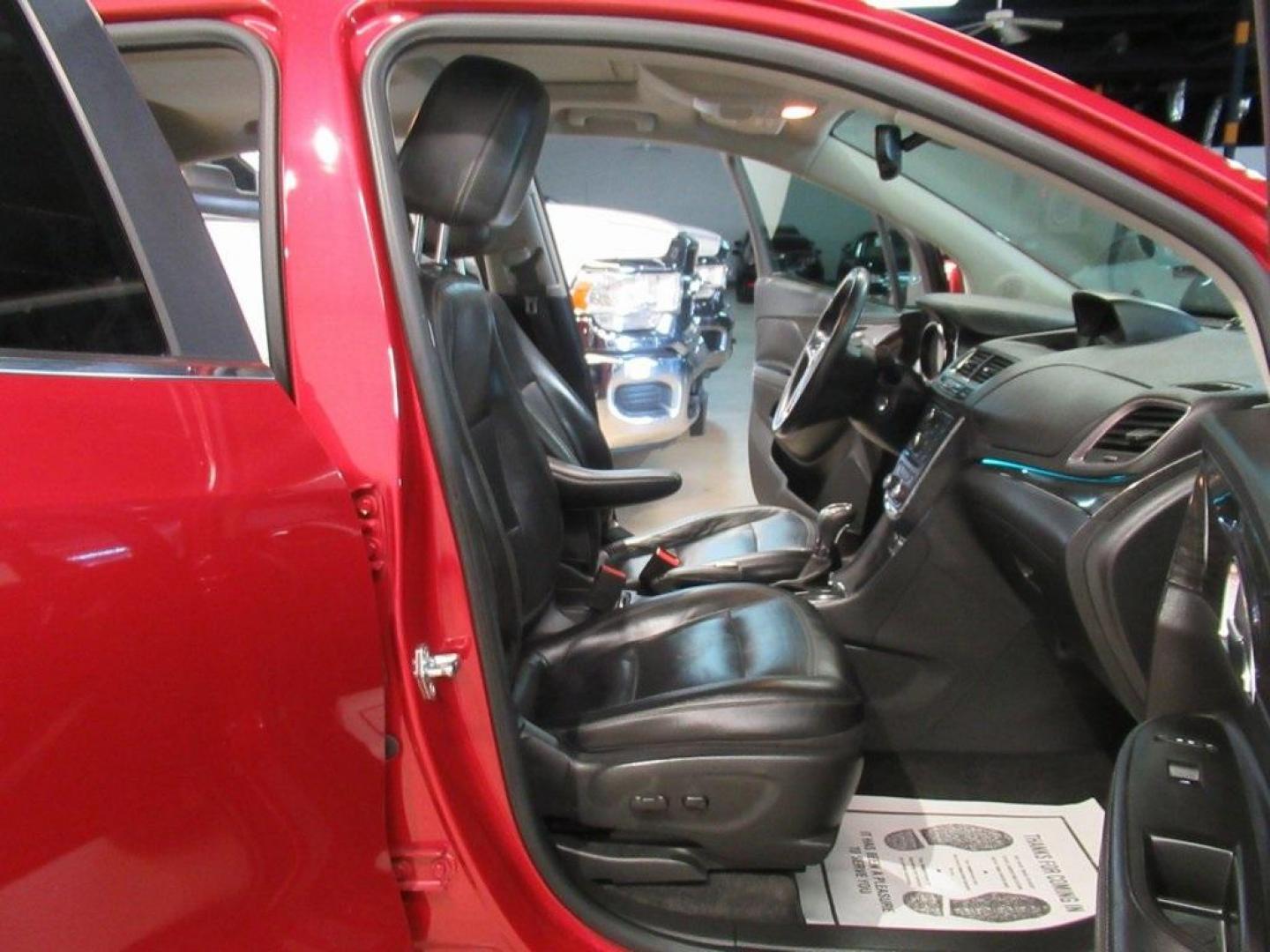 2014 Ruby Red Metallic /Ebony Buick Encore Leather (KL4CJCSBXEB) with an ECOTEC 1.4L I4 SMPI DOHC Turbocharged VVT engine, Automatic transmission, located at 15300 Midway Rd., Addison, TX, 75001, (972) 702-0011, 32.958321, -96.838074 - HOME OF THE NO HAGGLE PRICE - WHOLESALE PRICES TO THE PUBLIC!! Bluetooth, Hands Free Connectivity, Navigation, Backup Camera, Leather Seats, Sunroof / Moonroof, Encore Leather, 4D Sport Utility, ECOTEC 1.4L I4 SMPI DOHC Turbocharged VVT, 6-Speed Automatic, FWD, Ruby Red Metallic, Ebony Leather.<br>< - Photo#14