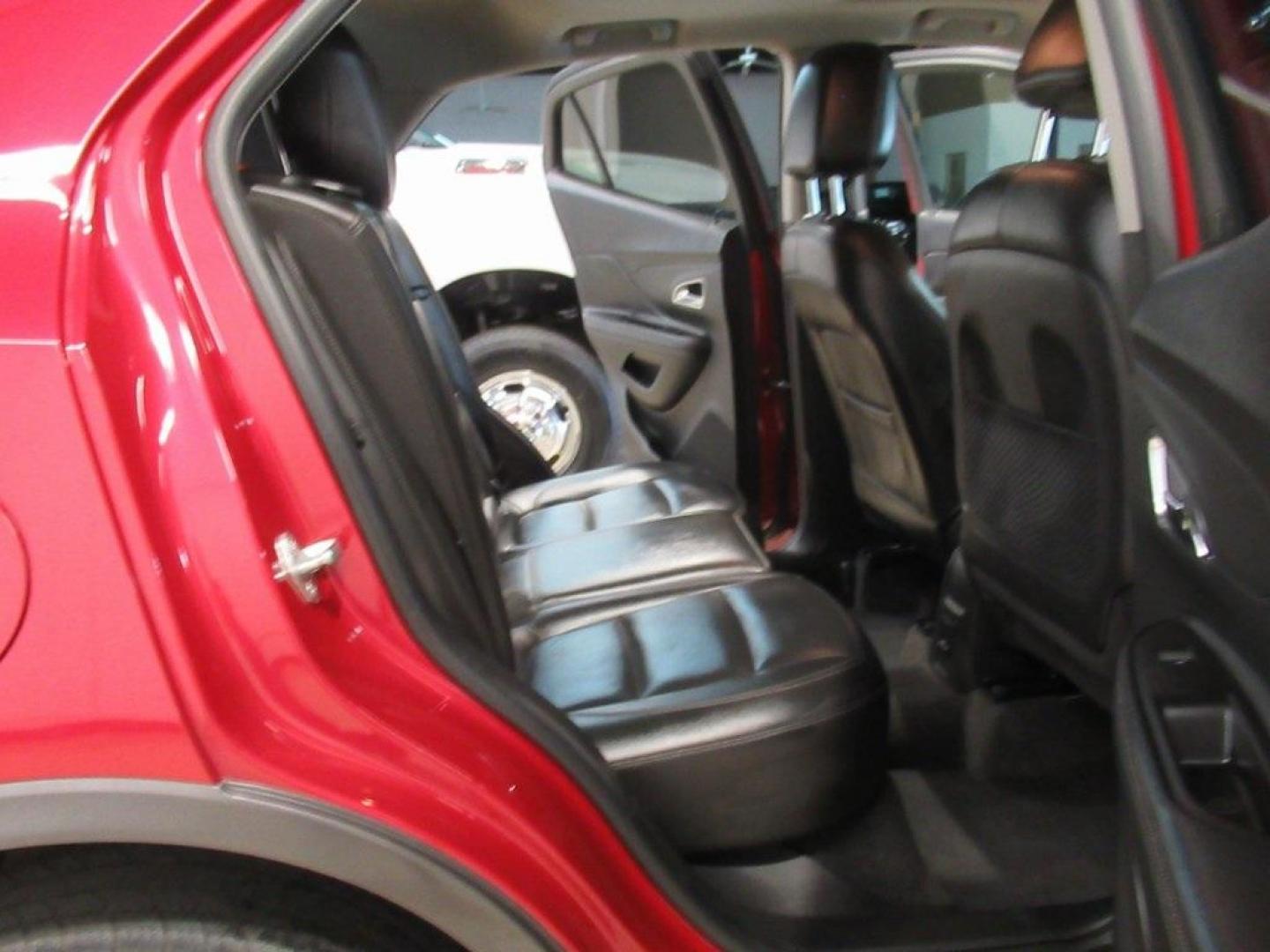 2014 Ruby Red Metallic /Ebony Buick Encore Leather (KL4CJCSBXEB) with an ECOTEC 1.4L I4 SMPI DOHC Turbocharged VVT engine, Automatic transmission, located at 15300 Midway Rd., Addison, TX, 75001, (972) 702-0011, 32.958321, -96.838074 - HOME OF THE NO HAGGLE PRICE - WHOLESALE PRICES TO THE PUBLIC!! Bluetooth, Hands Free Connectivity, Navigation, Backup Camera, Leather Seats, Sunroof / Moonroof, Encore Leather, 4D Sport Utility, ECOTEC 1.4L I4 SMPI DOHC Turbocharged VVT, 6-Speed Automatic, FWD, Ruby Red Metallic, Ebony Leather.<br>< - Photo#15