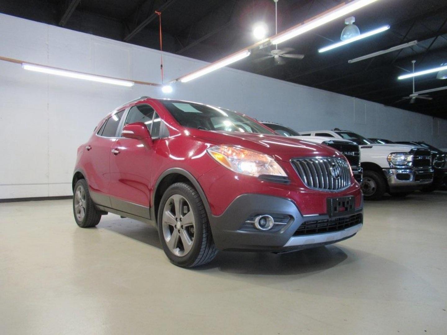 2014 Ruby Red Metallic /Ebony Buick Encore Leather (KL4CJCSBXEB) with an ECOTEC 1.4L I4 SMPI DOHC Turbocharged VVT engine, Automatic transmission, located at 15300 Midway Rd., Addison, TX, 75001, (972) 702-0011, 32.958321, -96.838074 - HOME OF THE NO HAGGLE PRICE - WHOLESALE PRICES TO THE PUBLIC!! Bluetooth, Hands Free Connectivity, Navigation, Backup Camera, Leather Seats, Sunroof / Moonroof, Encore Leather, 4D Sport Utility, ECOTEC 1.4L I4 SMPI DOHC Turbocharged VVT, 6-Speed Automatic, FWD, Ruby Red Metallic, Ebony Leather.<br>< - Photo#1