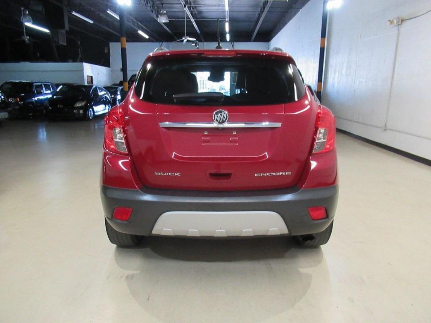 2014 Ruby Red Metallic /Ebony Buick Encore Leather (KL4CJCSBXEB) with an ECOTEC 1.4L I4 SMPI DOHC Turbocharged VVT engine, Automatic transmission, located at 15300 Midway Rd., Addison, TX, 75001, (972) 702-0011, 32.958321, -96.838074 - HOME OF THE NO HAGGLE PRICE - WHOLESALE PRICES TO THE PUBLIC!! Bluetooth, Hands Free Connectivity, Navigation, Backup Camera, Leather Seats, Sunroof / Moonroof, Encore Leather, 4D Sport Utility, ECOTEC 1.4L I4 SMPI DOHC Turbocharged VVT, 6-Speed Automatic, FWD, Ruby Red Metallic, Ebony Leather.<br>< - Photo#7